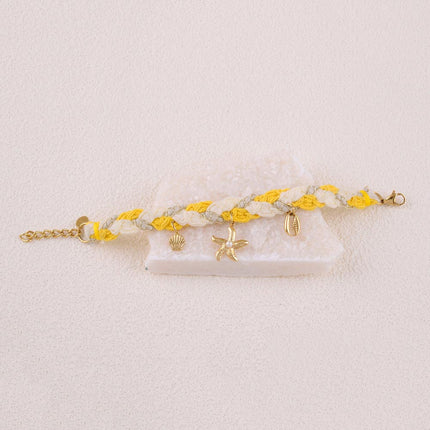 Maracya cord bracelet - buoy clasp and marine charms (seashells, starfish and cowrie shells)