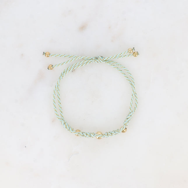 Sliding bracelet on cord - braided pattern and steel beads