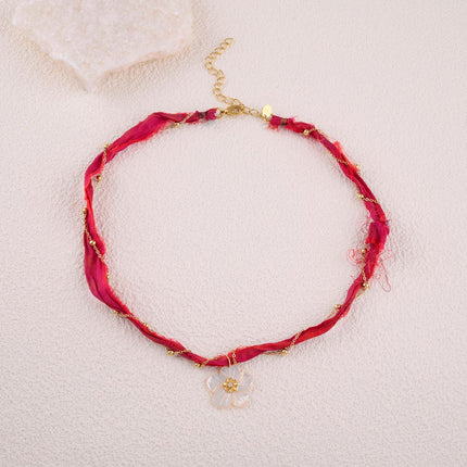 Collier en tissu tressé Naïora - fleur nacrée avec cristal