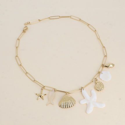 Collier Lualy - breloques marins (étoiles de mer, poisson en acétate et coquillages) et pâtes de verre