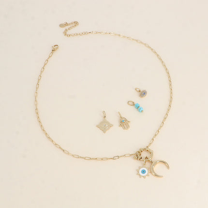 Cartelette CARPEDIEM Collier et 6 pendentifs (soleil oeil en émail et corne)