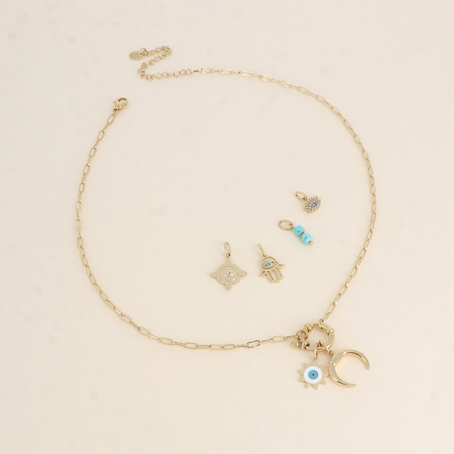 Cartelette CARPEDIEM Collier et 6 pendentifs (soleil oeil en émail et corne)