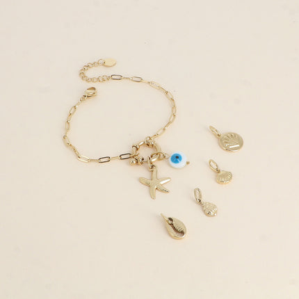 Cartelette SUMMER VIBES Bracelet et 6 pendentifs (oeil en émail et étoile de mer)
