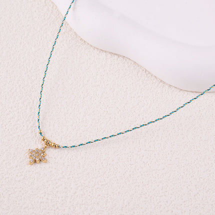Collier sur fil - étoile du Nord avec oxydes de zirconium