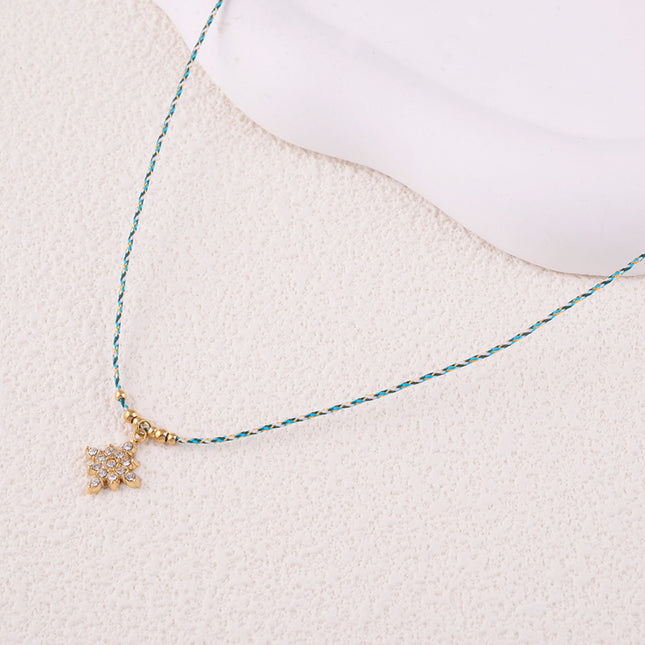 Collier sur fil - étoile du Nord avec oxydes de zirconium