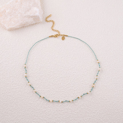 Collier ras de cou Mangora - cordon et perles d'eau douce