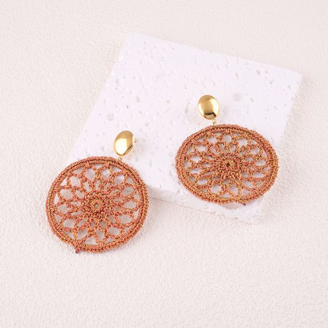 Boucles pendantes - pièce ovale plate et pièce en tissu tressé formant rosace