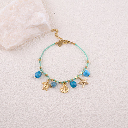 Bracelet - cord with tassels (shells, starfish, turtle) and natural stones