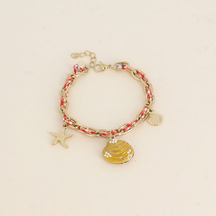 Bracelet - chaîne et cordon tressé, 3 pampilles (étoile de mer, coquillage émaillé et coquillage)