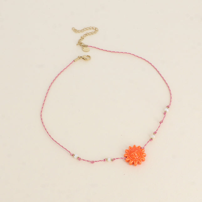 Collier sur cordon - ras de cou, perles d'eau douce et soleil en céramique émailée