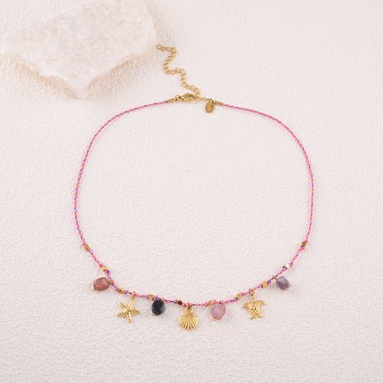 Collier - cordon avec pampilles (coquillages, étoile de mer, tortue) et pierres naturelles