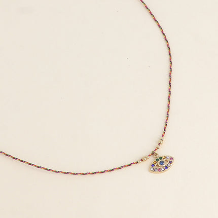Collier sur cordon Isola - oeil ajouré et oxydes de zirconium