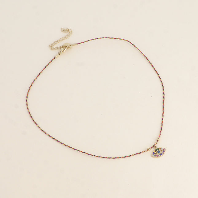 Collier sur cordon Isola - oeil ajouré et oxydes de zirconium