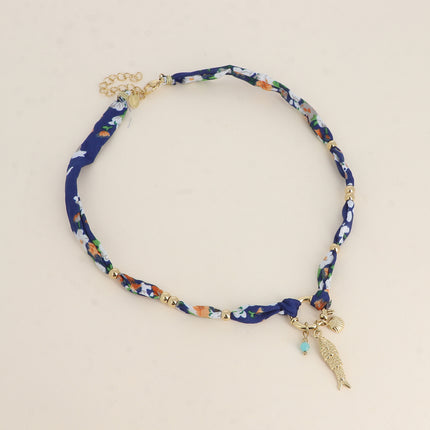 Collier Kiwana - tissu avec fermoir bouée, pendentifs coquillage, poisson et perle taillée