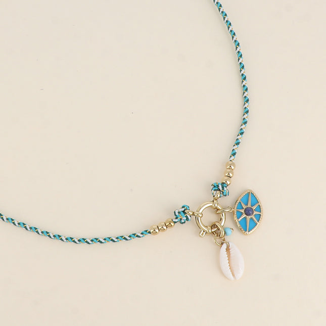 Collier sur cordon - fermoir bouée et breloques (oeil et cauri naturel)