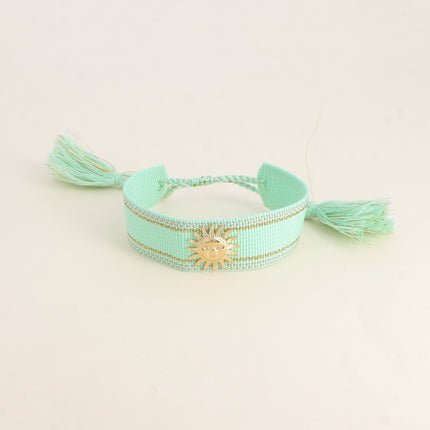 Bracelet coulissant Delphine - tissu et pièce soleil souriant