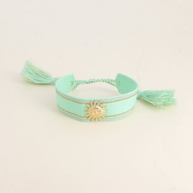 Bracelet coulissant Delphine - tissu et pièce soleil souriant