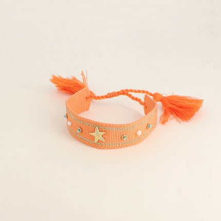 Bracelet en tissu coulissant Passéna - oeil en émail et oxydes de zirconium, perles d'eau douce et pompons