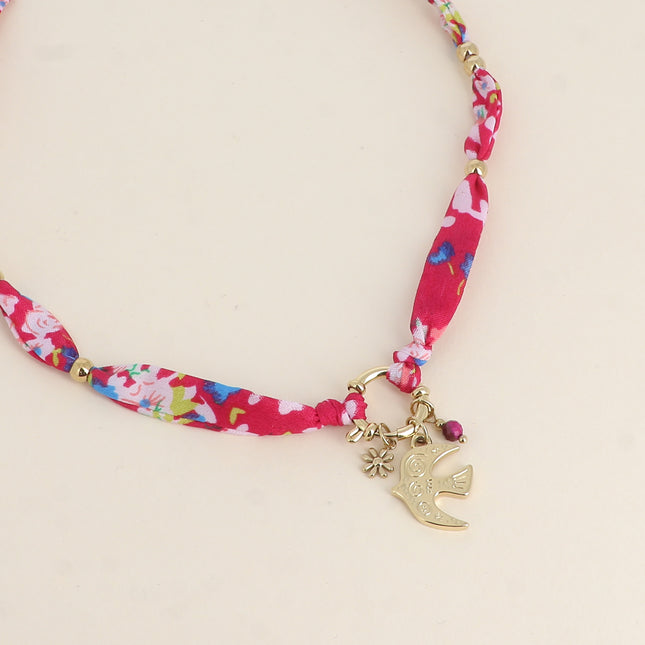 Collier - tissu avec fermoir bouée, pendentifs perle taillée, fleur et oiseau