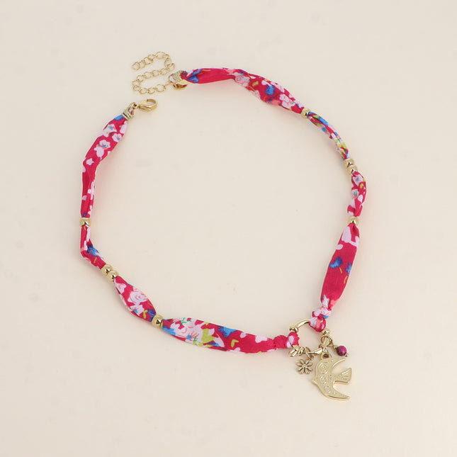 Collier - tissu avec fermoir bouée, pendentifs perle taillée, fleur et oiseau