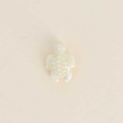 Perle tortue en céramique et émail