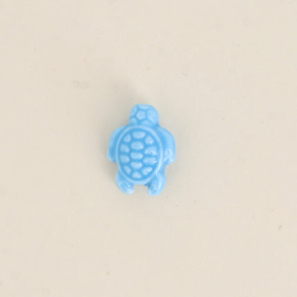 Perle tortue en céramique et émail