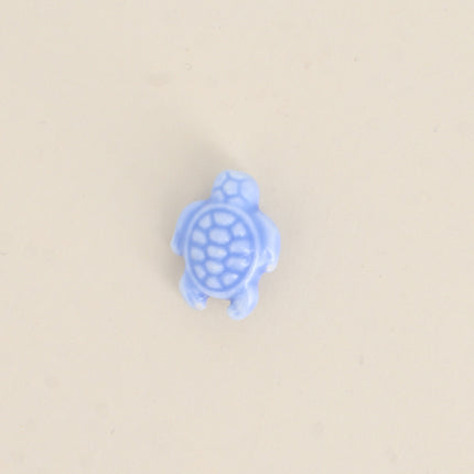 Perle tortue en céramique et émail
