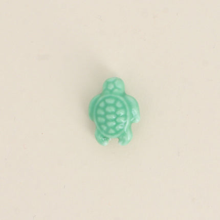 Perle tortue en céramique et émail
