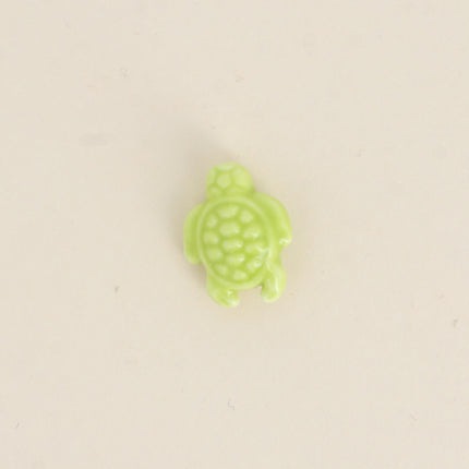 Perle tortue en céramique et émail