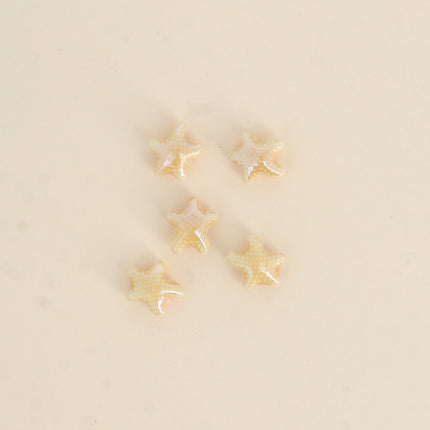 Perle étoile de mer XS en céramique et émail