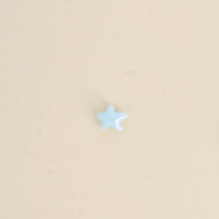 Perle étoile de mer XS en céramique et émail