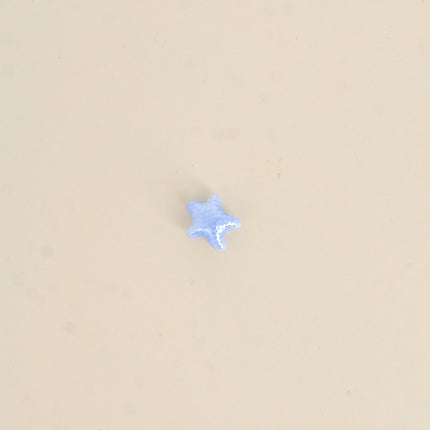 Perle étoile de mer XS en céramique et émail