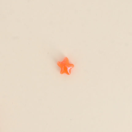 Perle étoile de mer XS en céramique et émail