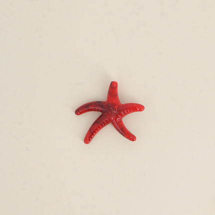 Perle étoile de mer M en résine