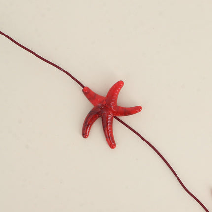 Perle étoile de mer M en résine
