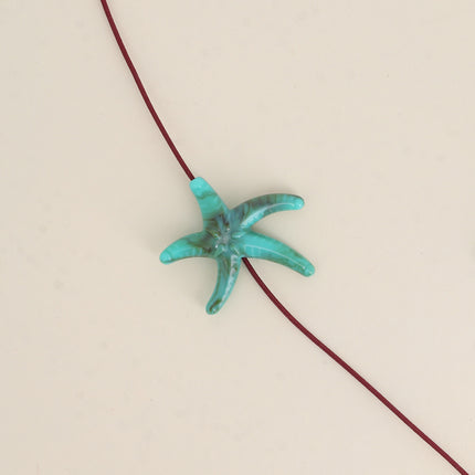 Perle étoile de mer M en résine