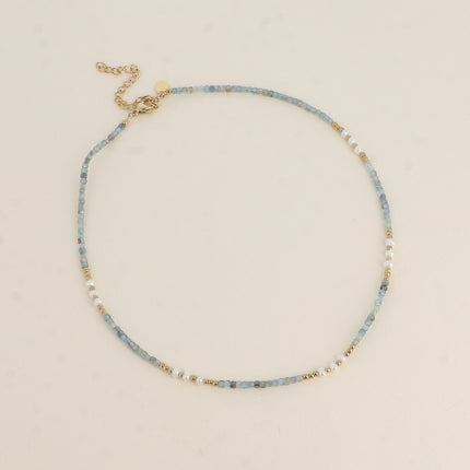 Collier sur câble - perles en acier, perles d'eau douce et pierres naturelles cubiques