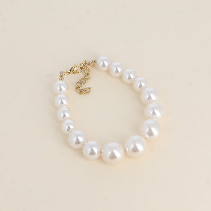 Bracelet Thereshi - perles en résine blanche rondes