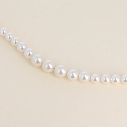 Bracelet Thereshi - perles en résine blanche rondes