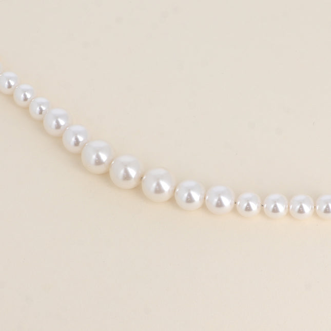 Thereshi Bracelet - round white resin beads