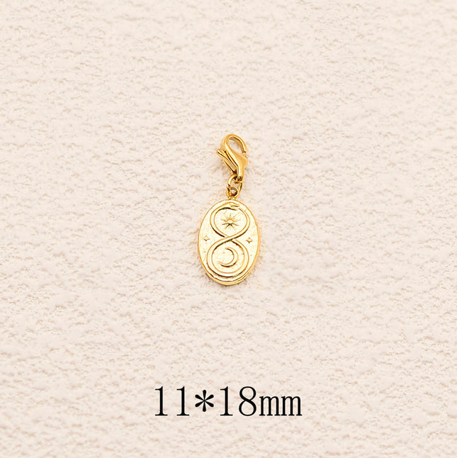 Charm - étoiles, lune, soleil, signe infini ∞, serpent
