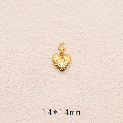 Charm Nubea - coeur aux petits points gravés