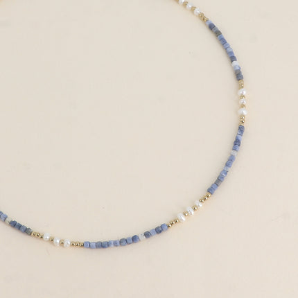 Collier sur câble - perles en acier, perles d'eau douce et pierres naturelles cubiques
