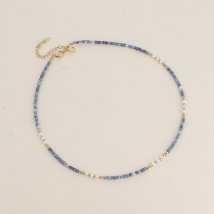 Collier sur câble - perles en acier, perles d'eau douce et pierres naturelles cubiques