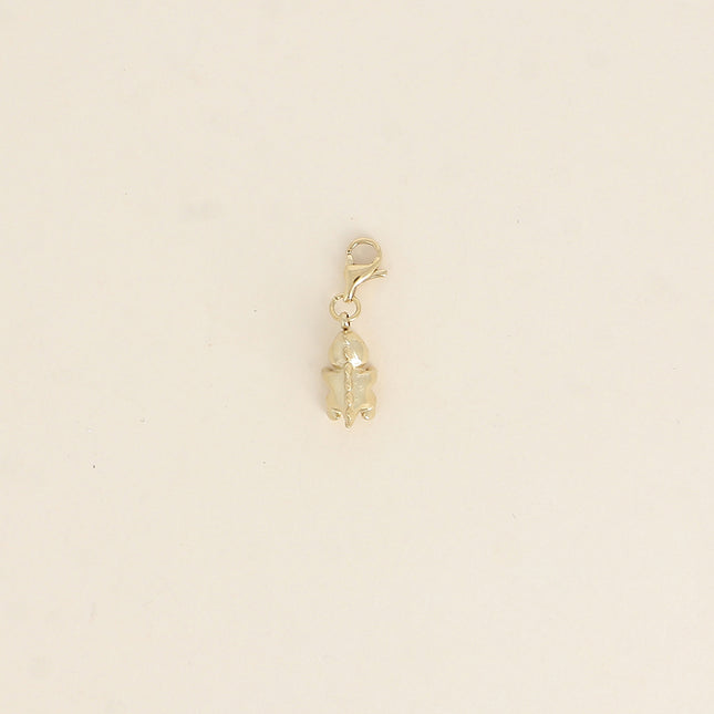 Charm - petit dinosaure avec coeur rouge