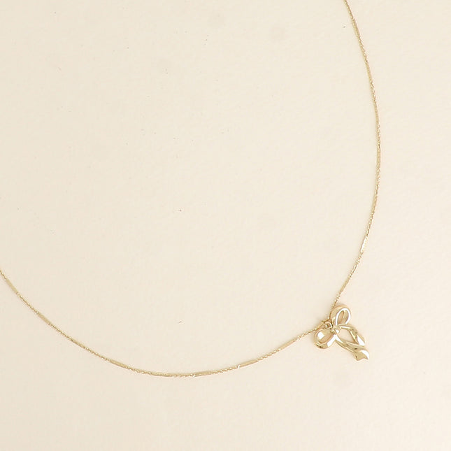 Collier - pendentif noeud papillon