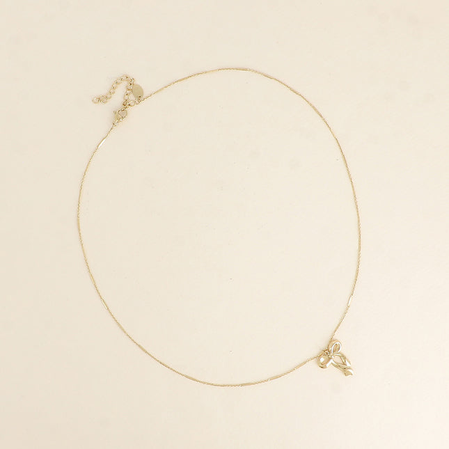 Collier - pendentif noeud papillon