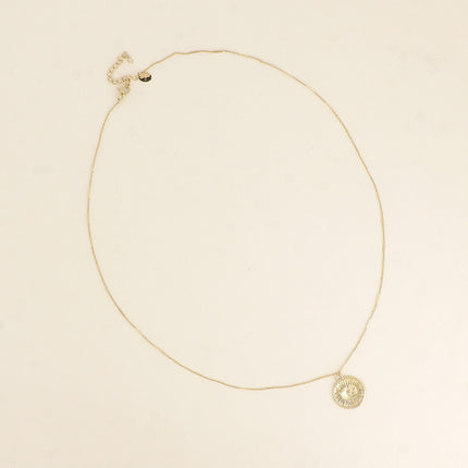 Collier - médaillon rond avec éclispe (lune, soleil, étoile)
