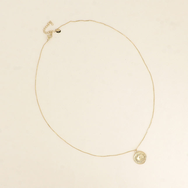 Necklace - round medallion with eclipse (moon, sun, star)