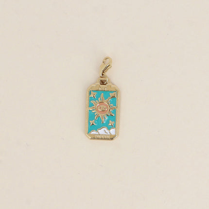 Charm Lucinae - plaquette avec oeil et soleil, nuages et étoiles